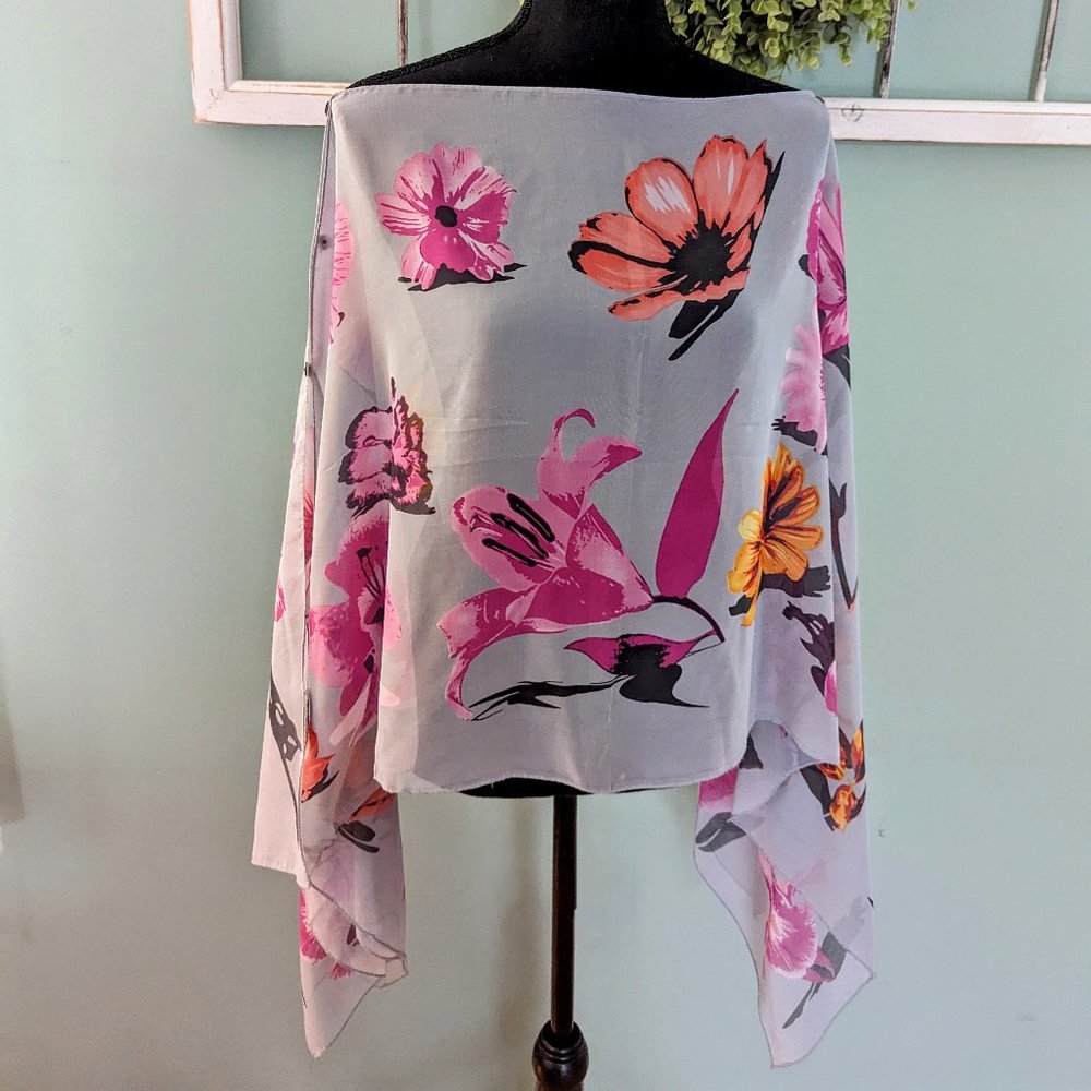 Paparazzi Shear Floral Poncho with buttons along each side